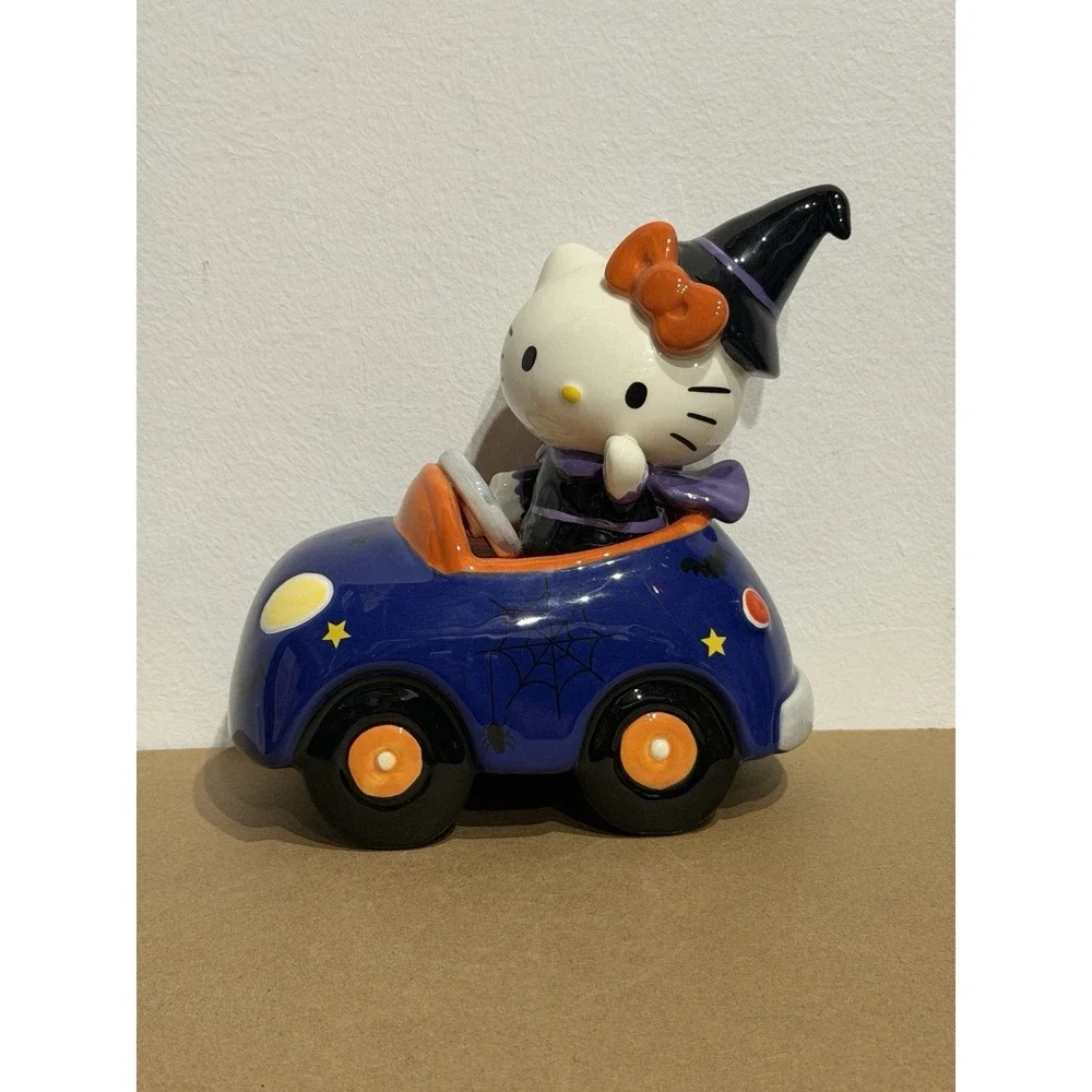 Hello Kitty Blue Sky Halloween Cute Ceramic Witch in Purple Car Orange Bow
